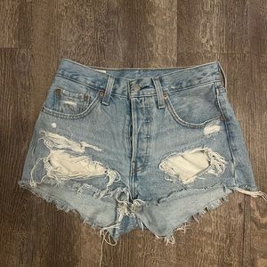 Ripped Levi light wash denim shorts
